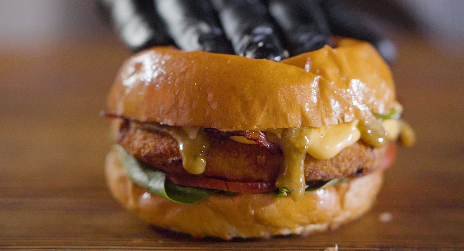 Chef preparing a burger