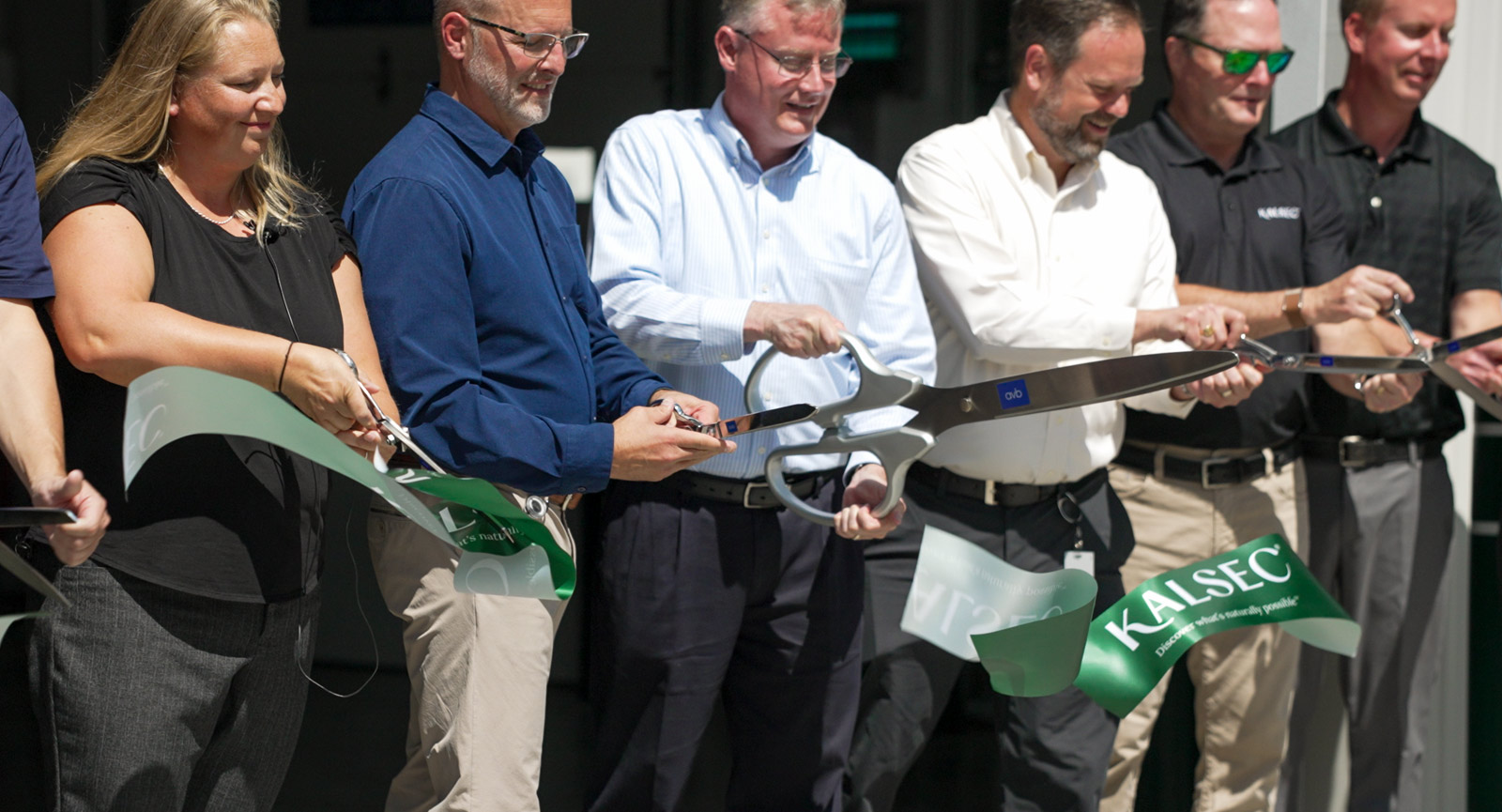 Cutting the ribbon at the Spice Processing Center event