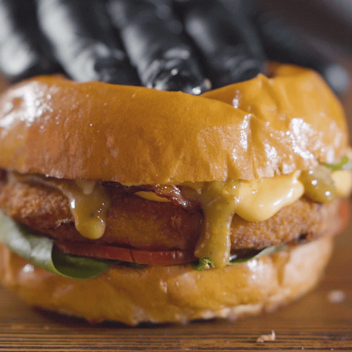Chef preparing burger
