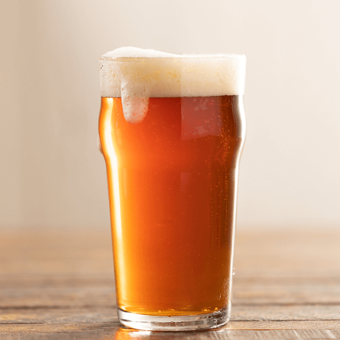 A beer with a frothy head