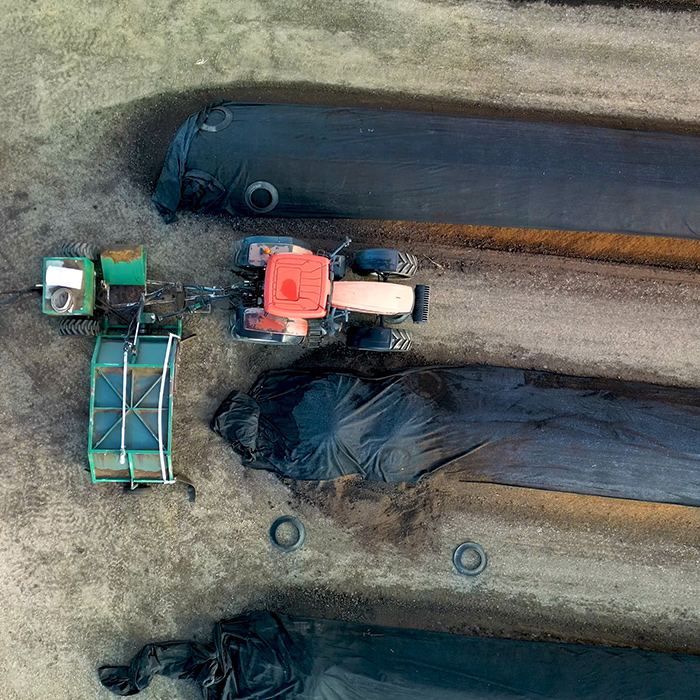 Drone footage of a tractor turning Kalsec's compost