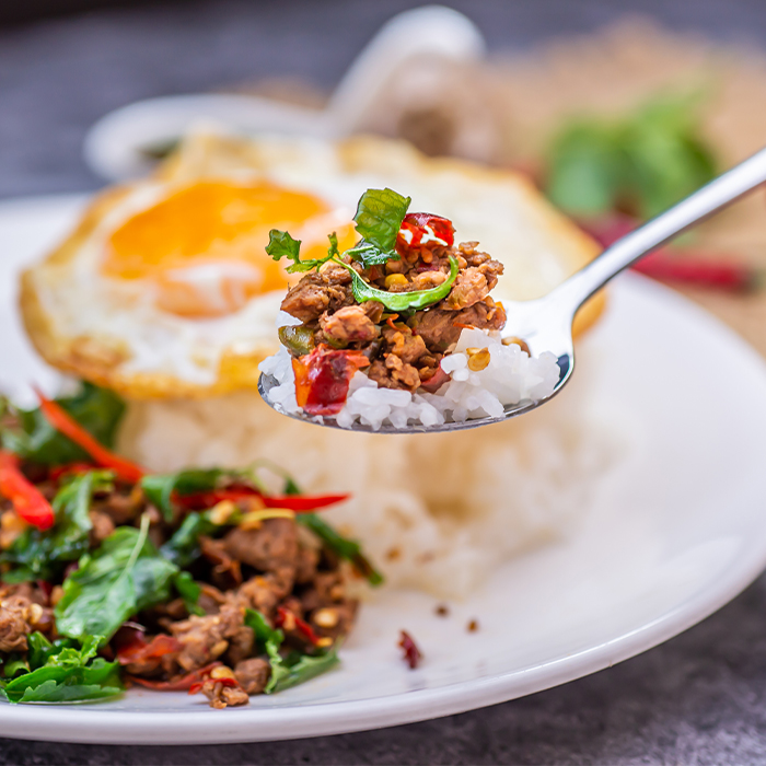 Spoonful of spicy beef and rice