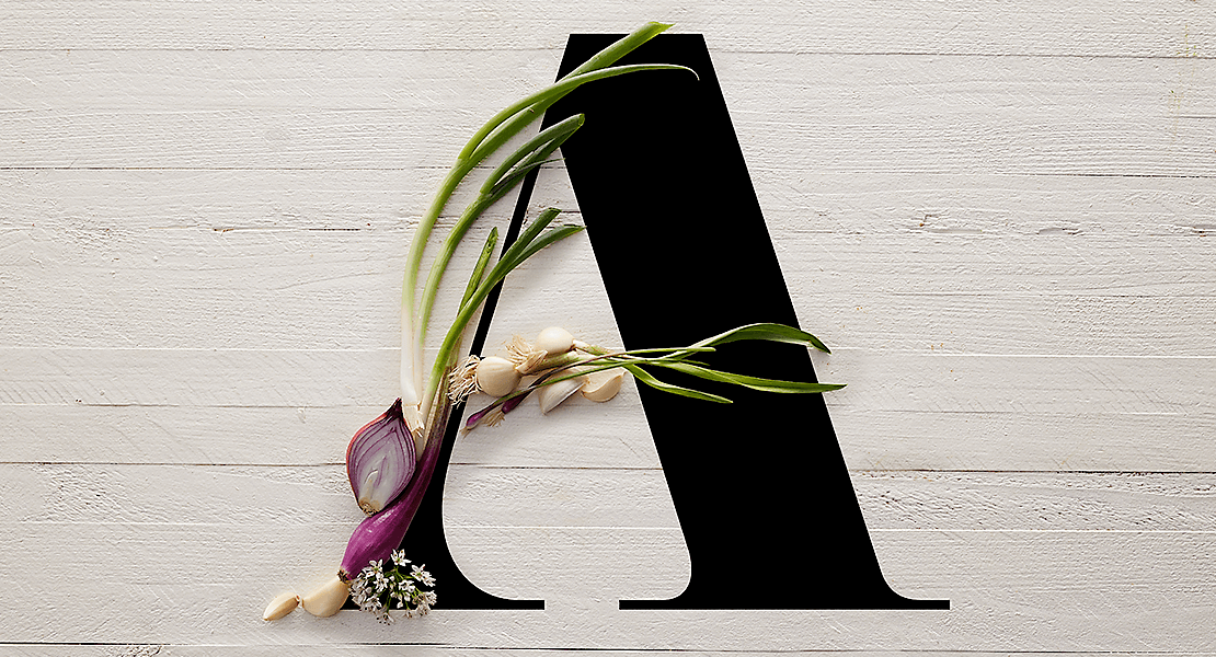 Letter "A" with alliums (garlic, red onion, green onion)