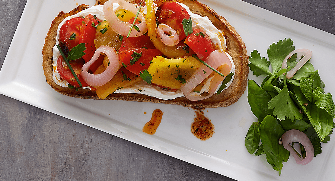 Tomatoes and onions on toast