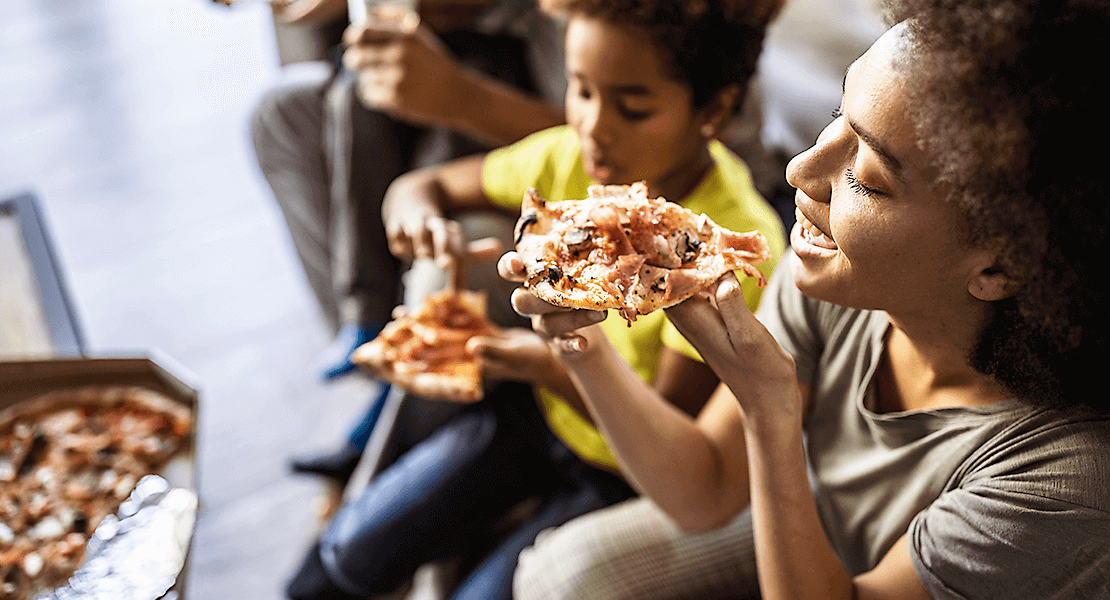 Family eating pizza