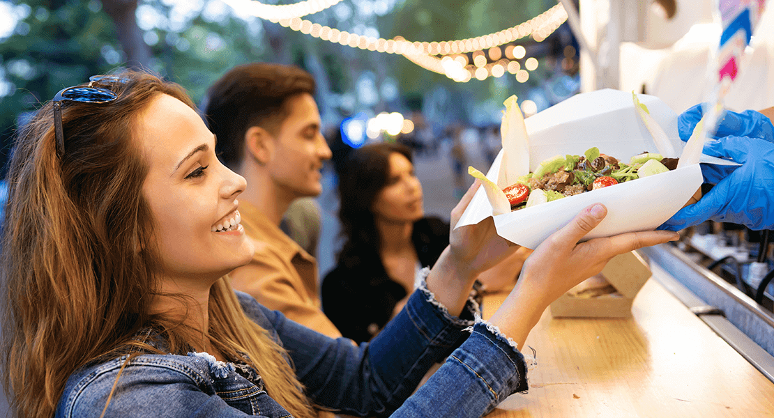 Woman receiving food order