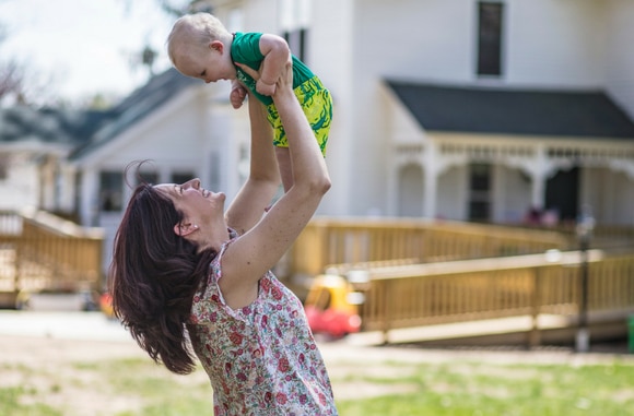 Kalsec employee and her son at the Farmhouse