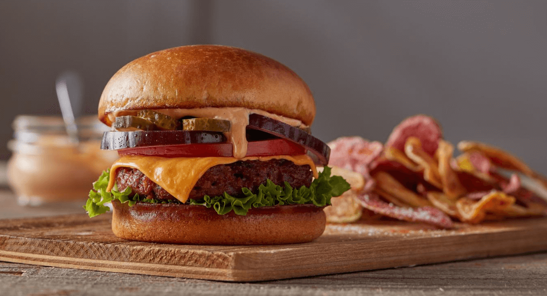 Plant-based protein burger with potato chips