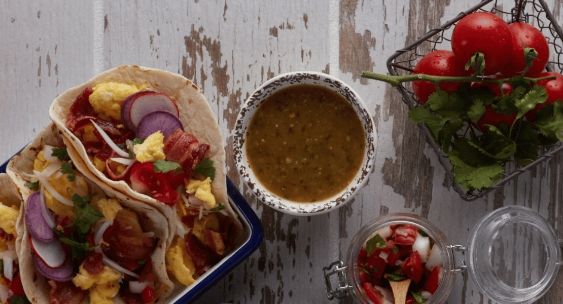 Tacos with a side of salsa and pico de gallo