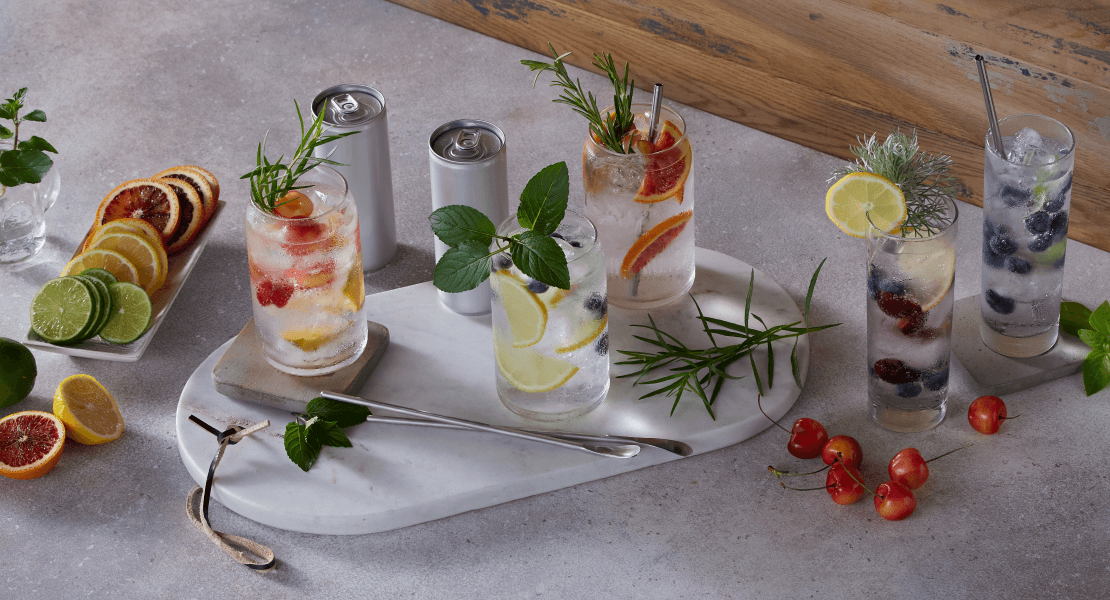 Hard seltzer in glasses with citrus slices