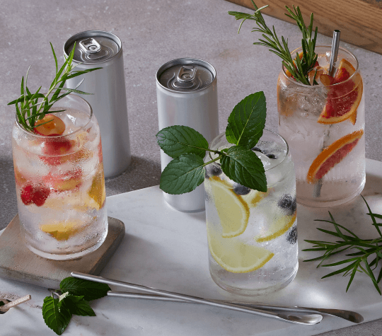 Hard seltzer in glasses with citrus slices